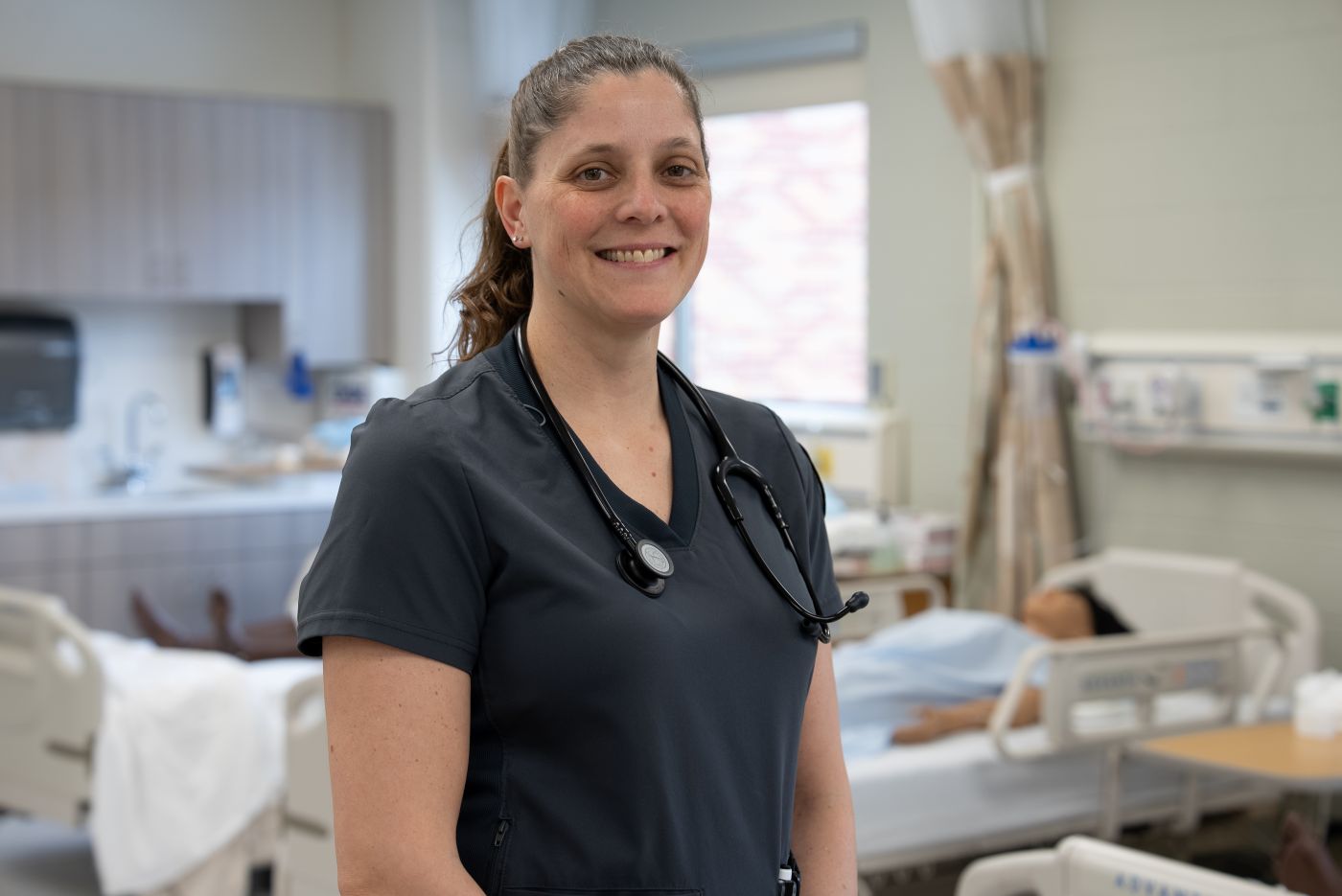 Photo of Hannah Poncin in the Nursing Lab